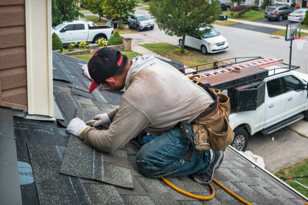 Professional Emergency Roof Repair technician working in Hightstown, NJ